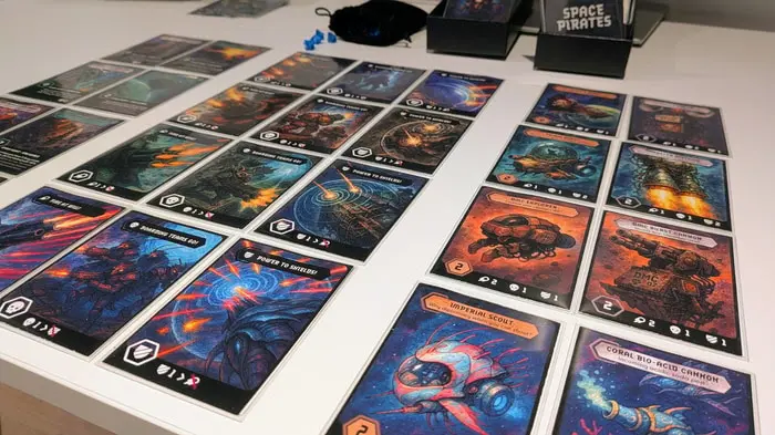 Early Space Pirates cards arranged on a table
